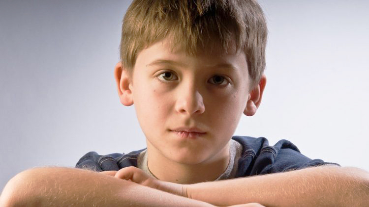 sad-and-wistful-boy-experiencing-the-impact-of-divorcing-parents