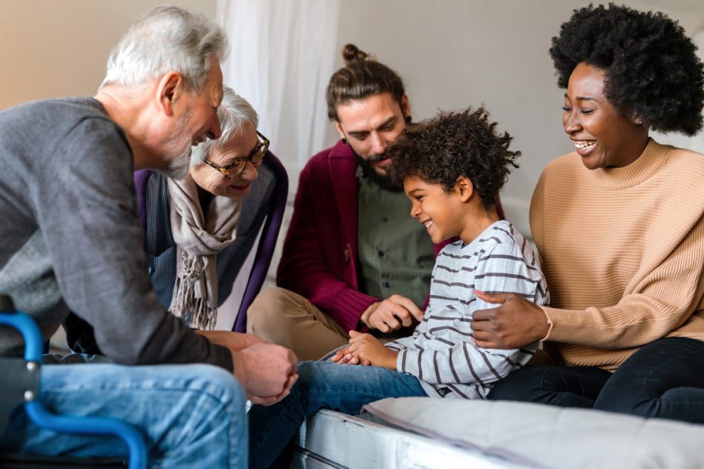 Portrait of multiethnic happy multi-generation family spending time together
