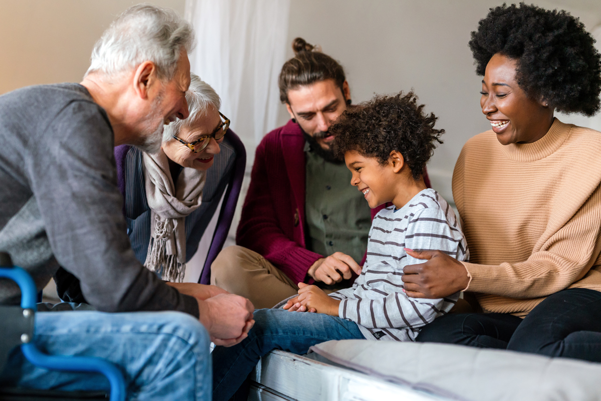 Portrait of multiethnic happy multi-generation family spending time together